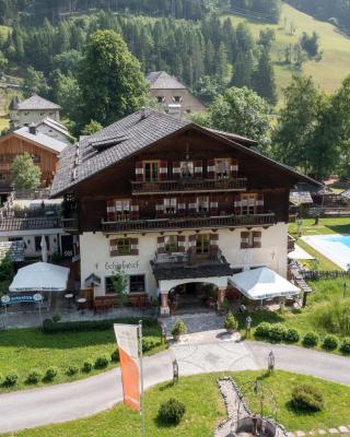 Schlosswirt Chalets & Apartments
