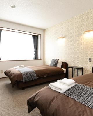 White Tree Lodge Madarao Tangram