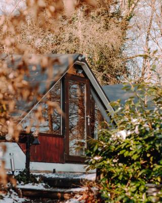 At Home - Chambre avec jacuzzi ou chalets dans les bois