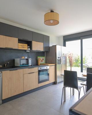 Logement cosy neuf avec jardin