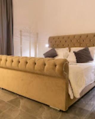 PALAZZO NOVECENTO Centro Storico Rooms & Wellness