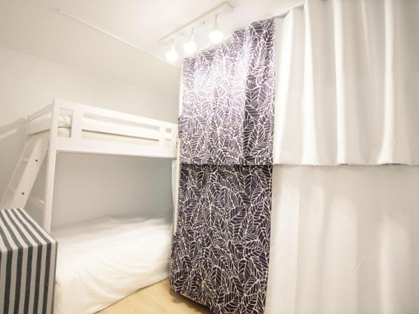 MTT Guest House : photo 2 de la chambre lit dans dortoir mixte de 4 lits
