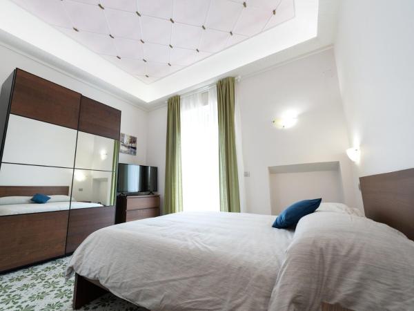 Bed & Breakfast Antonello : photo 1 de la chambre chambre quadruple