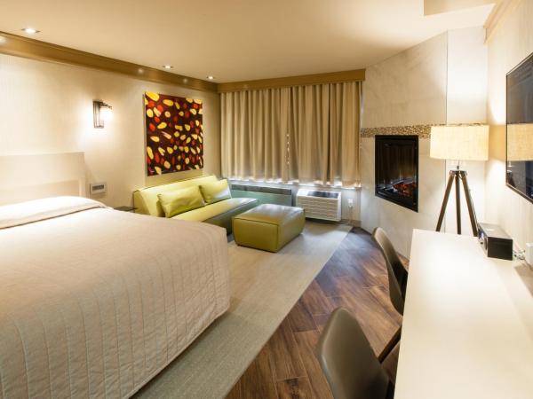 Le Chabrol Hotel & Suites : photo 1 de la chambre chambre lit king-size exécutive