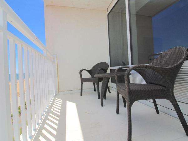 Ocean Sands Resort, Oceanfront, Virginia Beach by Vacatia : photo 8 de la chambre suite avec balcon