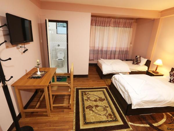 Aarya Chaitya Inn : photo 3 de la chambre chambre triple standard