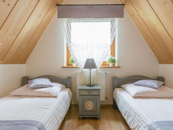 Willa Góralsko Riwiera : photo 1 de la chambre chambre quadruple deluxe