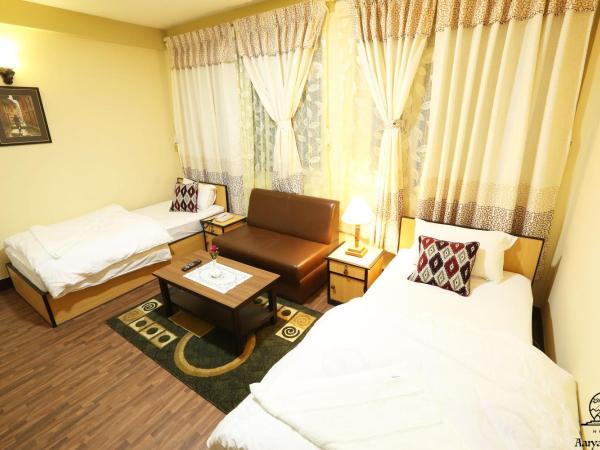 Aarya Chaitya Inn : photo 2 de la chambre chambre lits jumeaux standard