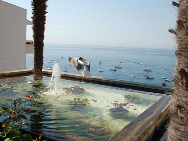 Gran Hotel Reymar 4 Sup : photo 4 de la chambre suite familiale (2 adultes + 2 enfants) - vue sur jardin