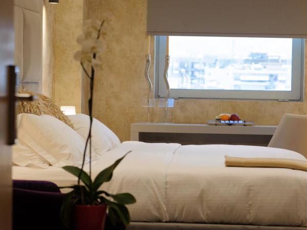 Athenaeum Grand Hotel : photo 5 de la chambre chambre deluxe double ou lits jumeaux