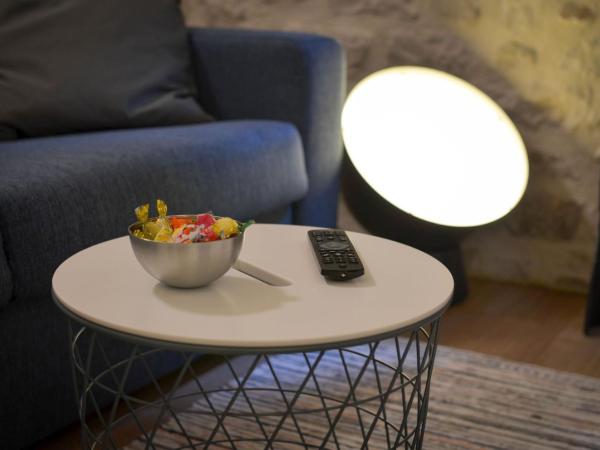 Apartments & Rooms Tiramola - Old Town : photo 4 de la chambre suite lit king-size