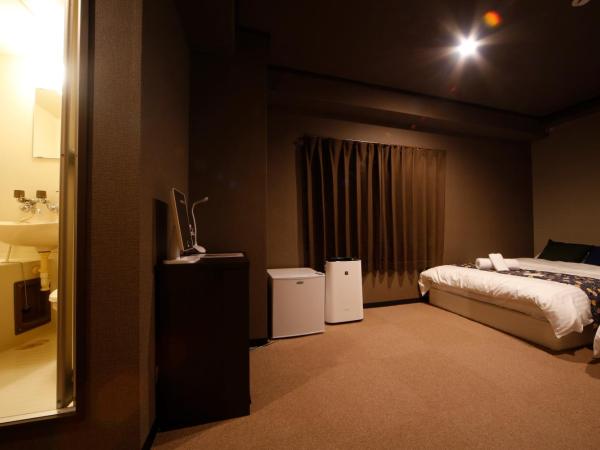 Sumiya Spa & Hotel : photo 3 de la chambre chambre lits jumeaux avec salle de bains privative