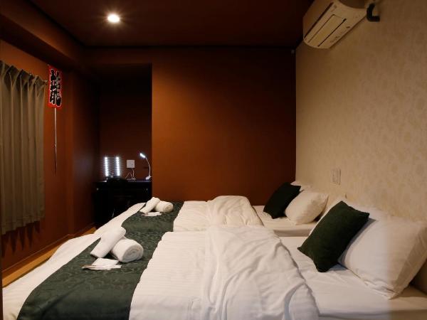 Sumiya Spa & Hotel : photo 1 de la chambre chambre lits jumeaux de style japonais avec salle de bains privative