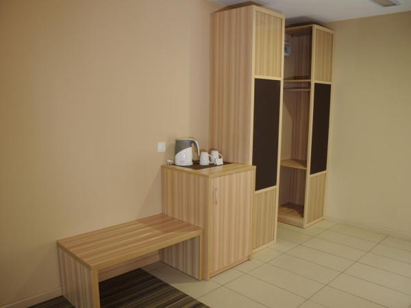 Zara's Boutique Hotel @ Harbour City : photo 3 de la chambre chambre lits jumeaux super de luxe - vue sur montagne