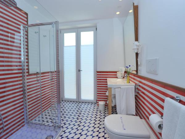 Maison Lauren : photo 1 de la chambre chambre double ou lits jumeaux - vue partielle sur mer