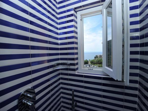 Maison Lauren : photo 9 de la chambre chambre double ou lits jumeaux deluxe - vue sur mer