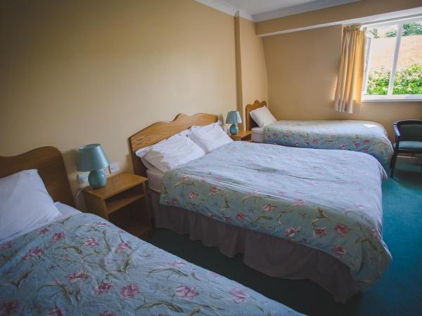 Diamond Hill Country House : photo 1 de la chambre chambre triple