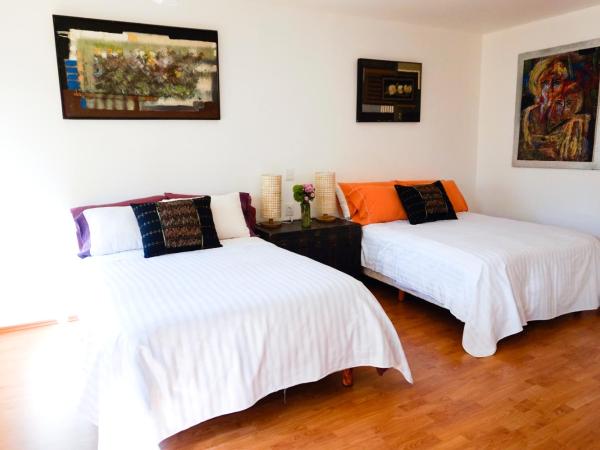 Casa Jacinta Guest House : photo 7 de la chambre chambre double avec 2 lits doubles