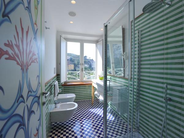 Maison Lauren : photo 10 de la chambre chambre double ou lits jumeaux deluxe - vue sur mer