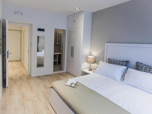 Priuli Luxury Rooms : photo 10 de la chambre chambre double deluxe avec balcon - annexe - 5 rue vukovarska