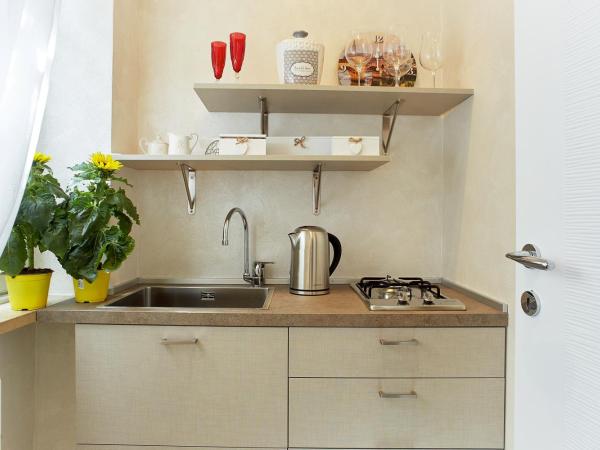 Residenza Elisabetta : photo 7 de la chambre chambre lit queen-size supérieure dans appartement tosca