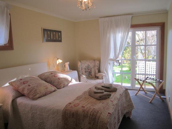 Magnolia Cottage : photo 4 de la chambre suite - vue sur jardin