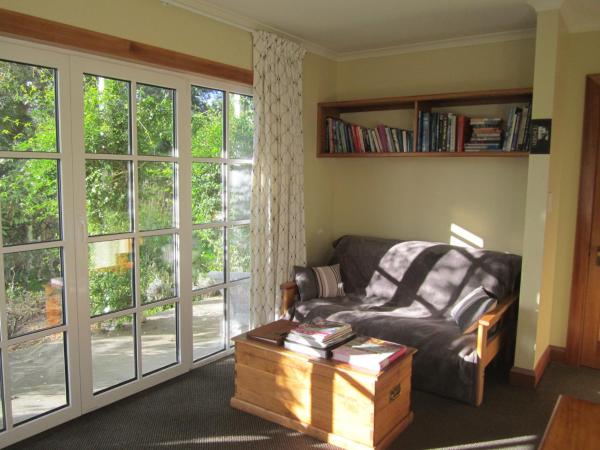 Magnolia Cottage : photo 6 de la chambre suite - vue sur jardin