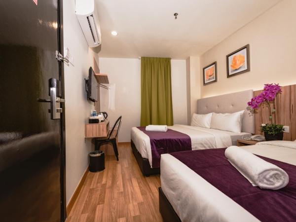 BIG M Hotel : photo 5 de la chambre hébergement familial triple de luxe