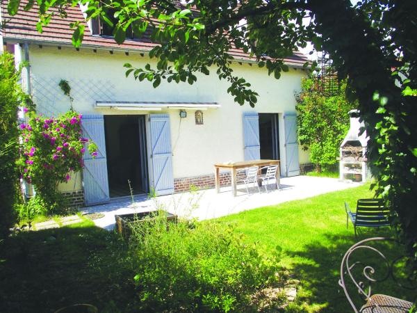 Chambre en ville dans un esprit campagne : photo 3 de la chambre chambre double avec patio