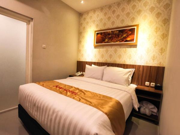 DOM Hotel Jogja : photo 2 de la chambre chambre lit king-size ou lits jumeaux supérieure