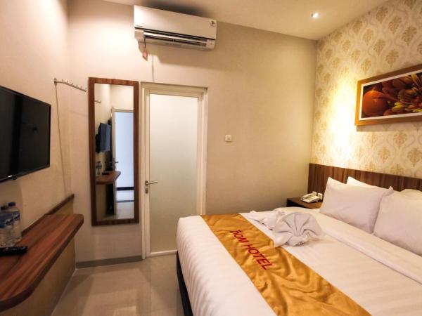 DOM Hotel Jogja : photo 4 de la chambre chambre lit king-size ou lits jumeaux supérieure