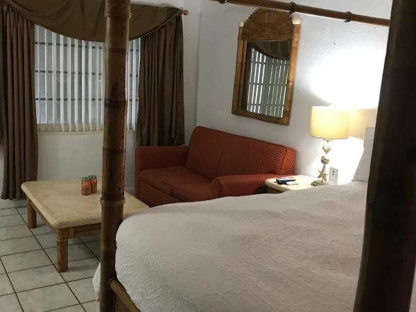Courtyard Villa Hotel : photo 3 de la chambre suite lit queen-size