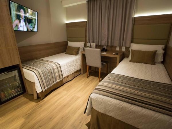 Petit Rio Hotel : photo 1 de la chambre chambre lits jumeaux pour personnes à mobilité réduite