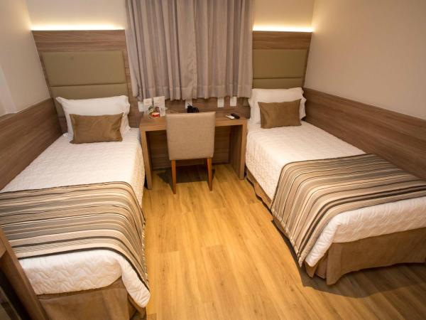 Petit Rio Hotel : photo 2 de la chambre chambre lits jumeaux pour personnes à mobilité réduite