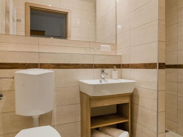 Hotel Solero : photo 8 de la chambre chambre lits jumeaux - vue sur jardin