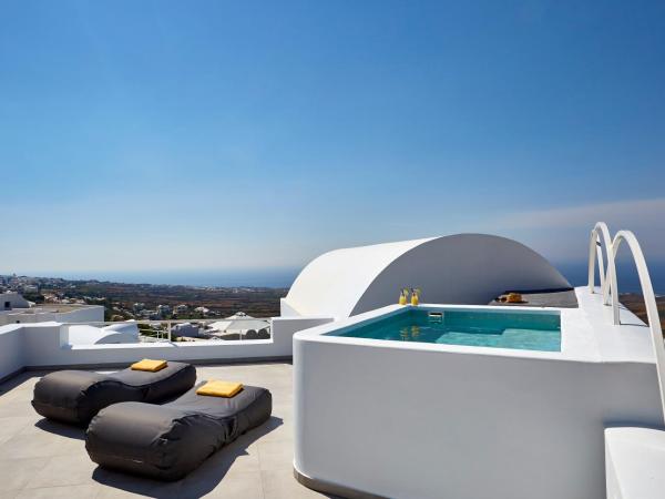 Aperanto Suites : photo 1 de la chambre suite deluxe avec jacuzzi extérieur chauffé