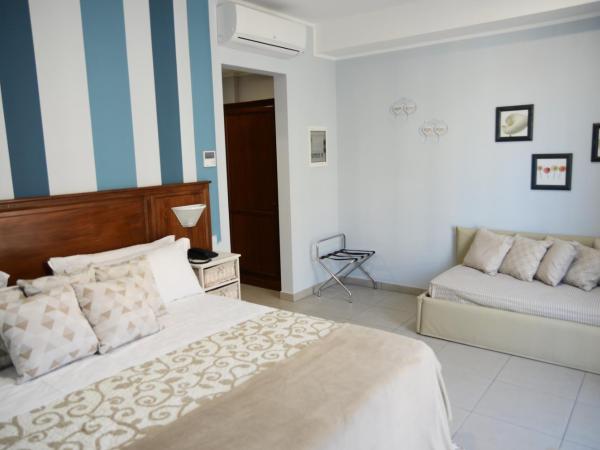 Hotel Giulio Cesare : photo 3 de la chambre chambre quadruple confort