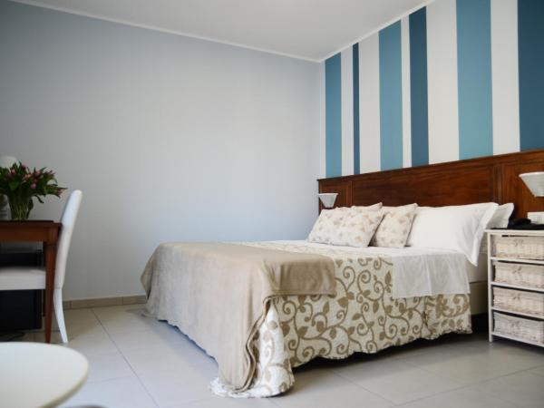 Hotel Giulio Cesare : photo 5 de la chambre chambre quadruple confort