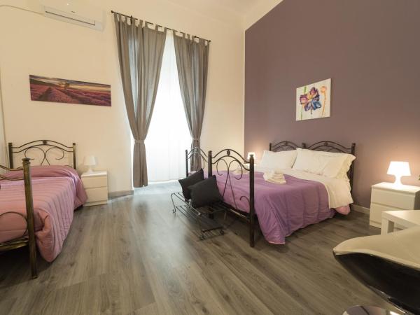 Tra L'Etna E Il Mare B&B : photo 1 de la chambre chambre quadruple