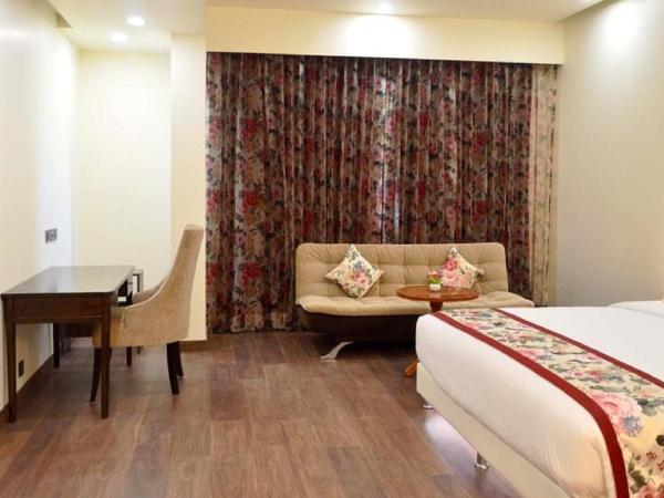 Hotel Grand Maple : photo 4 de la chambre chambre lit king-size deluxe