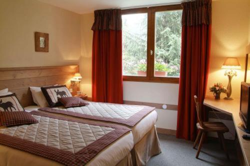 Hôtel Restaurant La Tourmaline : photo 1 de la chambre chambre double avec accès au spa