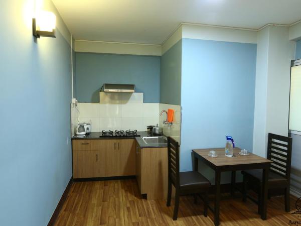 Aarya Chaitya Inn : photo 3 de la chambre suite standard