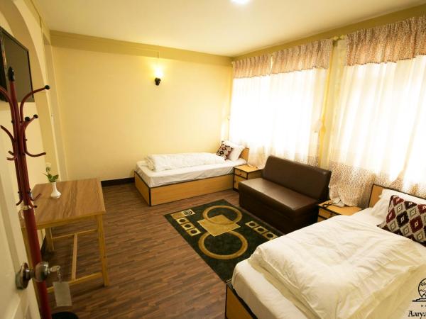 Aarya Chaitya Inn : photo 1 de la chambre chambre lits jumeaux standard