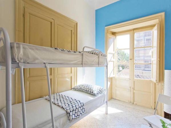 Sunshine Hostel Palermo : photo 2 de la chambre  lit dans dortoir pour hommes de 4 lits