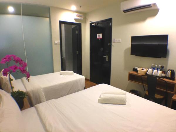 BIG M Hotel : photo 3 de la chambre chambre lits jumeaux supérieure sans fenêtre