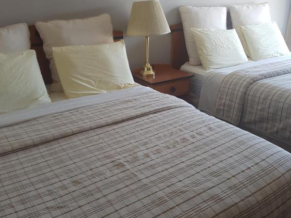 Olympia Lodge : photo 2 de la chambre chambre triple basique