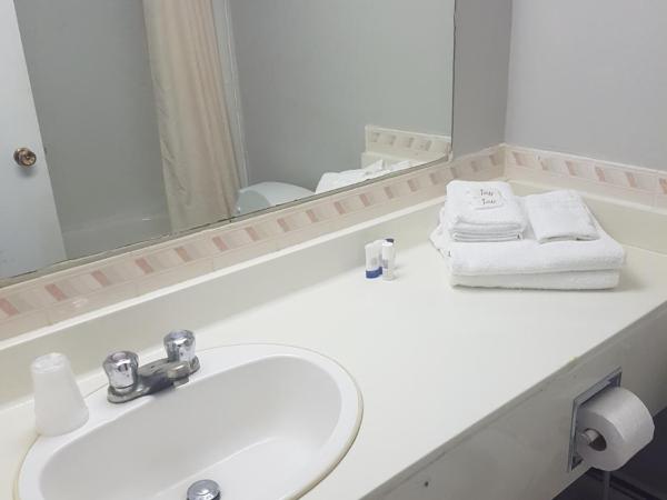 Olympia Lodge : photo 2 de la chambre chambre lit queen-size standard avec kitchenette