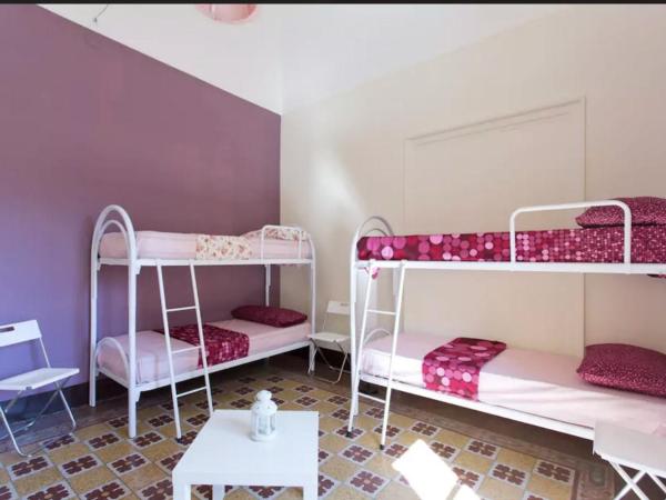 Sunshine Hostel Palermo : photo 4 de la chambre lit simple dans dortoir pour femmes