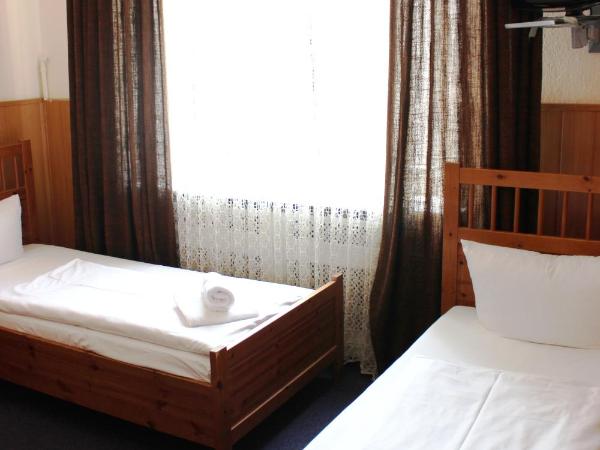 Hotel-Pension Rheingold am Kurfürstendamm : photo 4 de la chambre chambre lits jumeaux