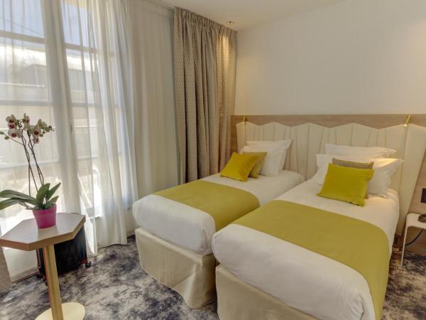 Best Western Plus Comedie Saint Roch : photo 4 de la chambre chambre lits jumeaux prestige
